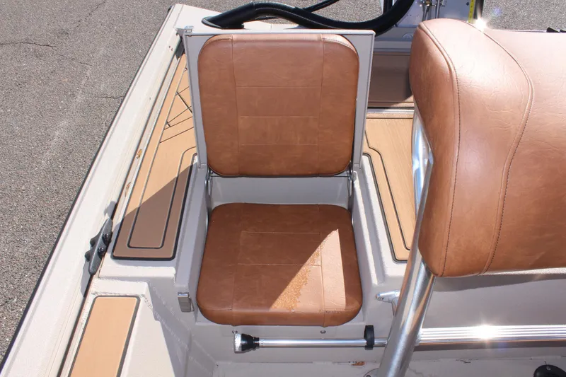 Slide: The Image of 2024 Avid ROGUE boat with brown leather seating. - 13