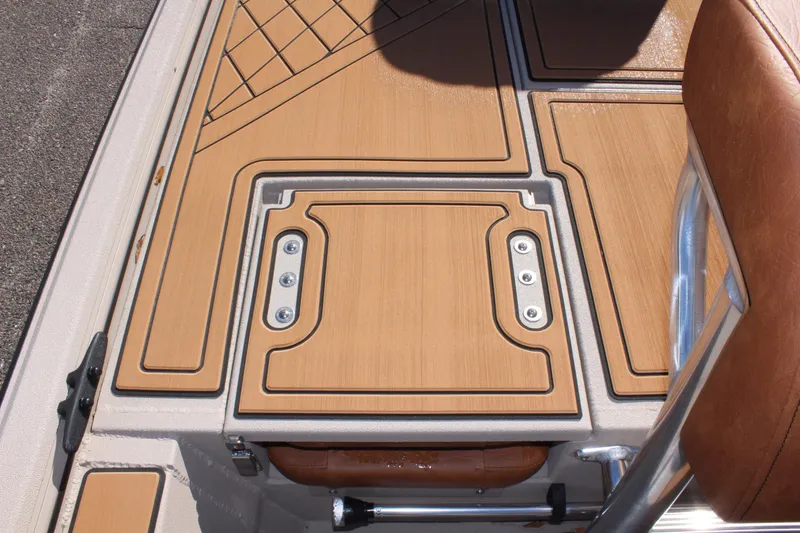 Slide: The Image of 2024 Avid ROGUE boat deck with tan and brown detailing. - 14