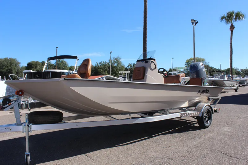 Slide: The Image of 2024 Avid ROGUE boat on a trailer in a sunny outdoor setting. - 4