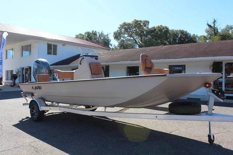 Slide: The Image of 2024 Avid ROGUE boat on a trailer outside a building. - 6