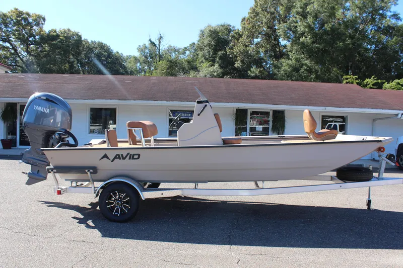 Slide: The Image of 2024 Avid ROGUE boat on trailer with Yamaha outboard motor. - 8