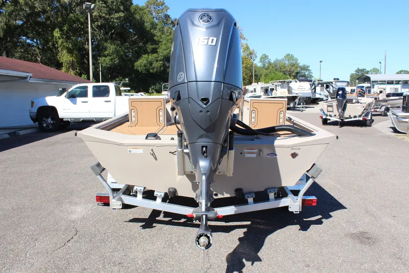 Slide: The Image of 2024 Avid ROGUE boat with a 150 HP engine on a trailer. - 9