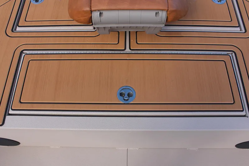 Slide: The Image of Avid ROGUE 2024 boat deck with storage compartments and seating. - 23