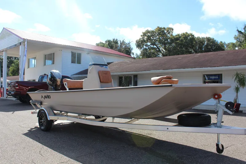 Slide: The Image of 2024 Avid ROGUE boat on trailer outside a building. - 4