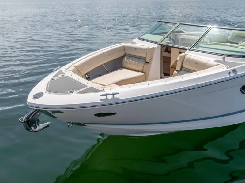 Slide: The Image of 2024 Regal LS6 boat on calm water, featuring spacious seating and sleek design. - 3