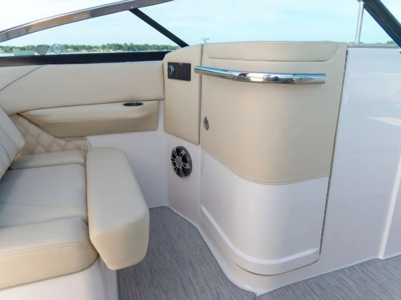 Slide: The Image of Interior of 2024 Regal LS6 boat with beige seating and modern design. - 8
