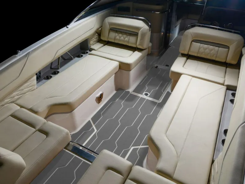 Slide: The Image of 2024 Regal LS6 boat interior with luxurious beige seating and modern design. - 9