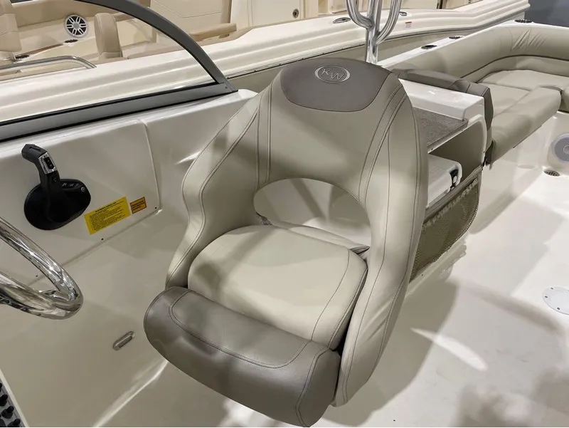 Slide: The Image of 2024 Key West 239 DFS boat interior with comfortable seating and modern controls. - 24