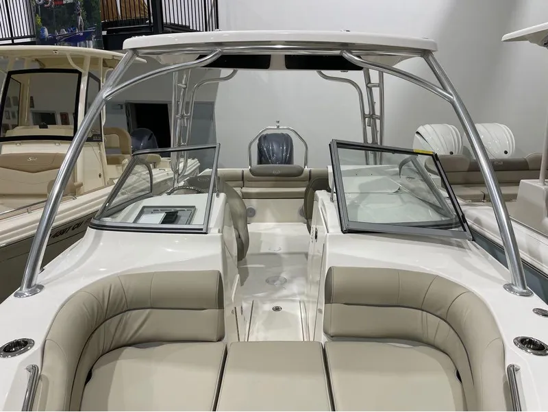 Slide: The Image of 2024 Key West 239 DFS boat interior with seating and windshield. - 27