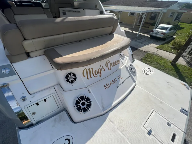 Slide: The Image of 2014 Regal 35 Sport Coupe boat stern with seating and speakers, named May's Ocean, Miami, FL. - 30