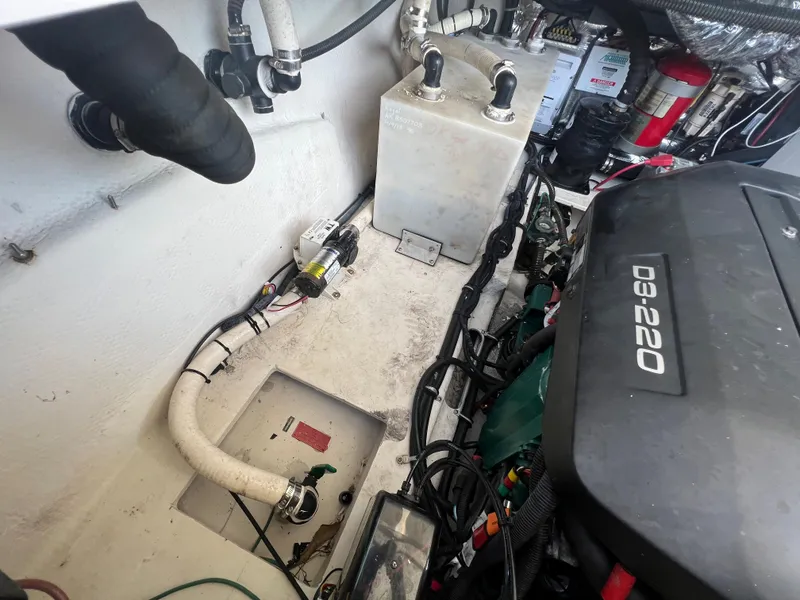 Slide: The Image of Engine compartment of a 2014 Regal 35 Sport Coupe boat. - 31