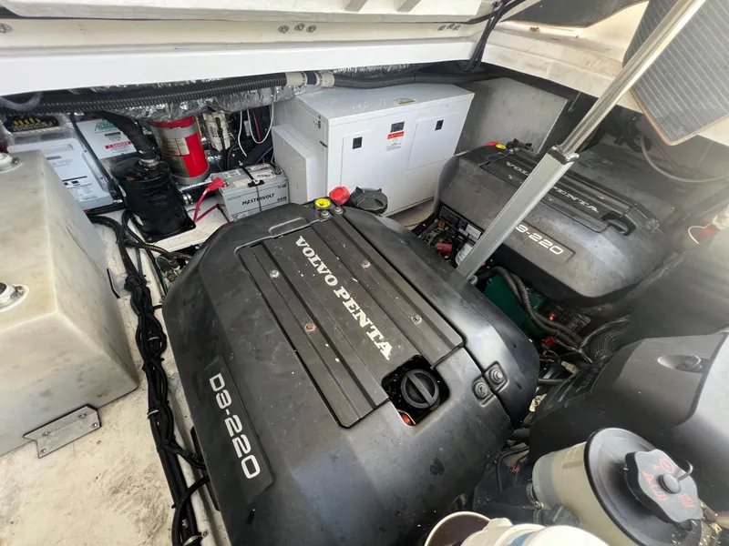 Slide: The Image of 2014 Regal 35 Sport Coupe engine compartment with Volvo Penta D3-220 engines. - 39