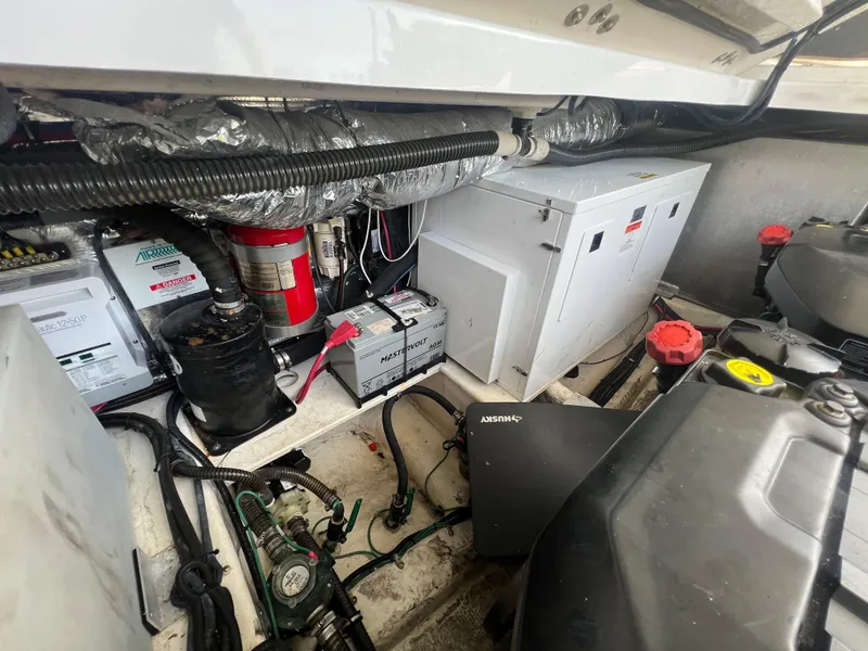 Slide: The Image of Engine compartment of a 2014 Regal 35 Sport Coupe boat. - 40