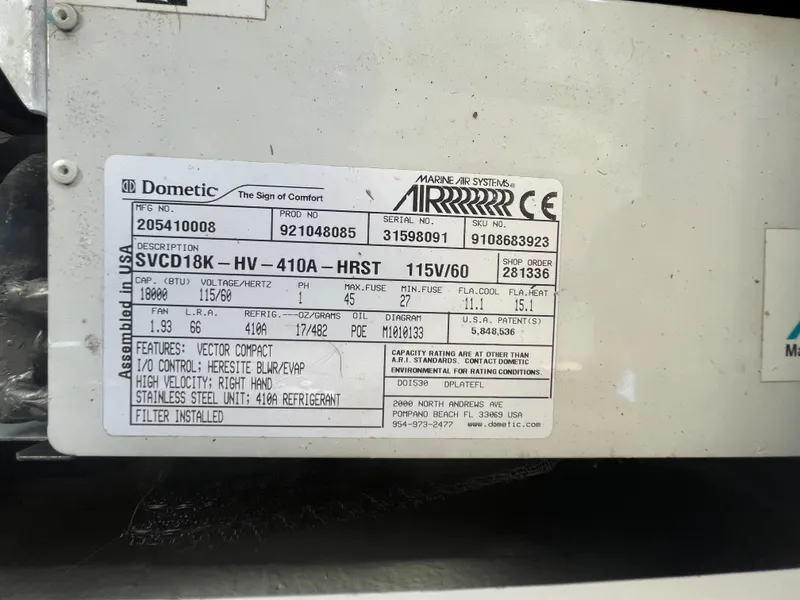 Slide: The Image of Label on a Dometic marine air system in a 2014 Regal 35 Sport Coupe. - 47