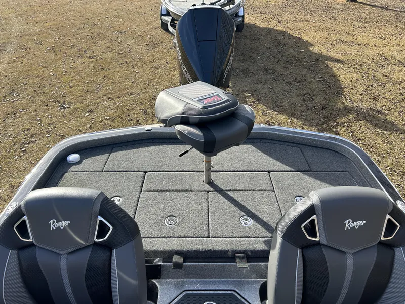 Slide: The Image of 2024 Ranger Z521R Ranger Cup Equipped boat interior with seats and storage compartments. - 12