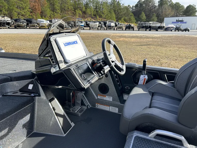Slide: The Image of 2024 Ranger Z521R Ranger Cup Equipped boat interior with Lowrance electronics and steering wheel. - 13
