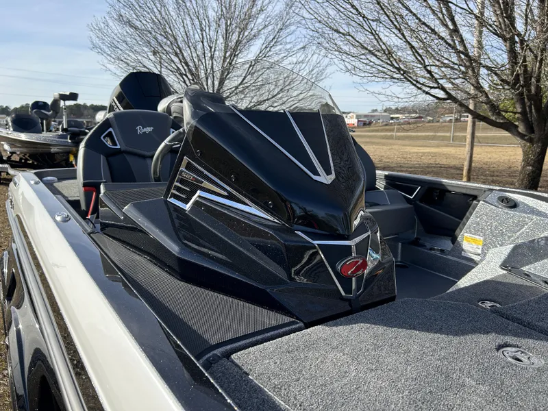 Slide: The Image of 2024 Ranger Z521R Ranger Cup Equipped boat, sleek black design, parked outdoors. - 16