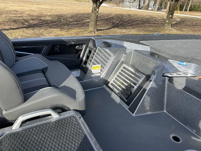 Slide: The Image of 2024 Ranger Z521R Ranger Cup Equipped boat interior with seating and storage compartments. - 21
