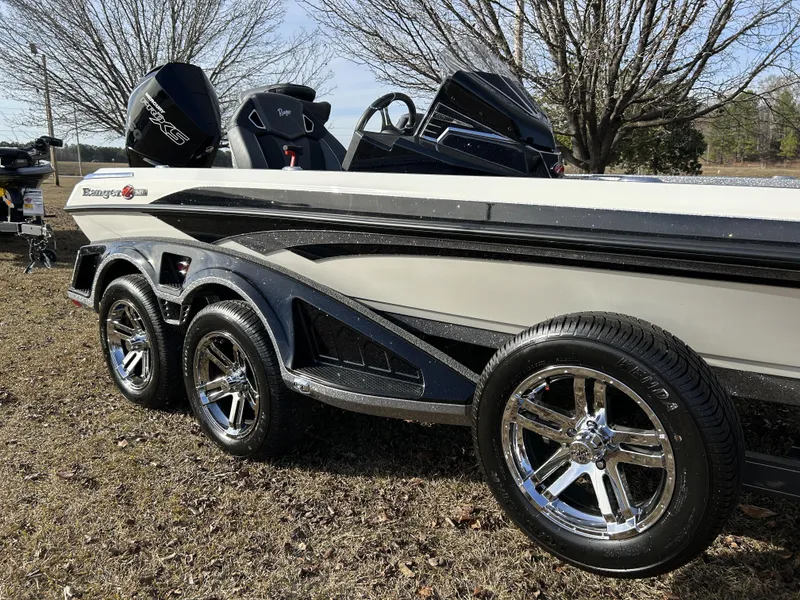Slide: The Image of 2024 Ranger Z521R Ranger Cup Equipped boat on a trailer with chrome wheels. - 5