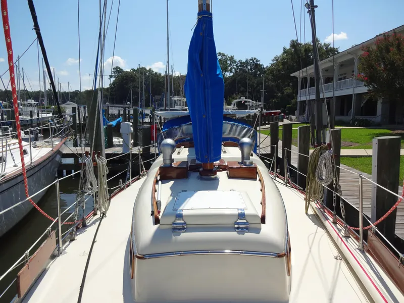 Slide: The Image of 1966 Cheoy Lee 36 Offshore Flying Buffalo yacht docked at marina. - 13