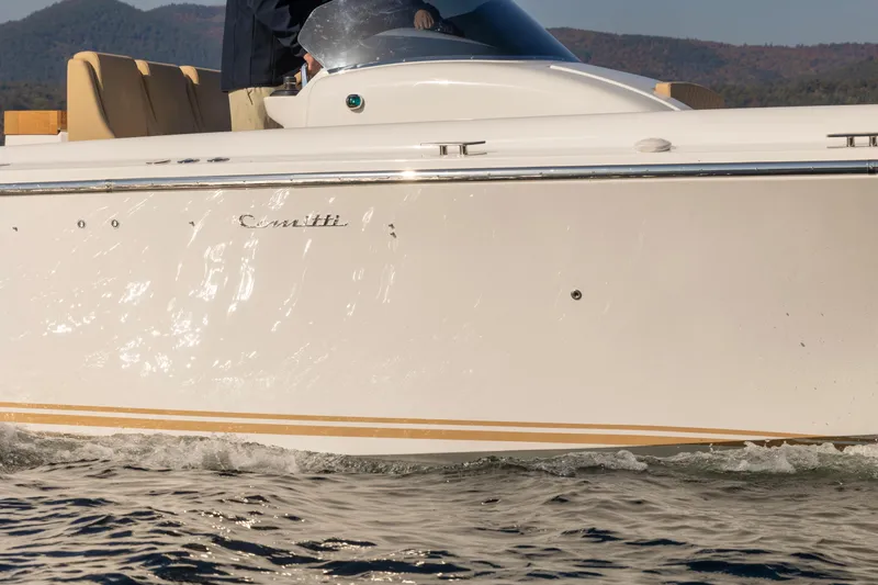 Slide: The Image of 2022 Comitti ISOLA 33 Sport SD cruising on water. - 11