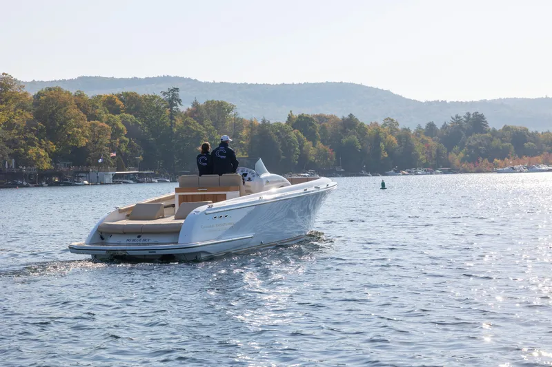 Slide: The Image of 2022 Comitti ISOLA 33 Sport SD cruising on a scenic lake. - 23