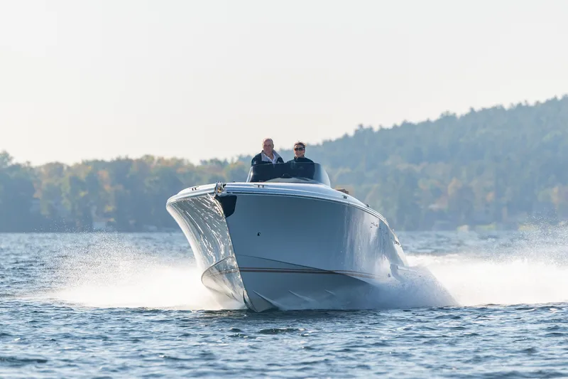Slide: The Image of 2022 Comitti ISOLA 33 Sport SD cruising on a lake. - 25