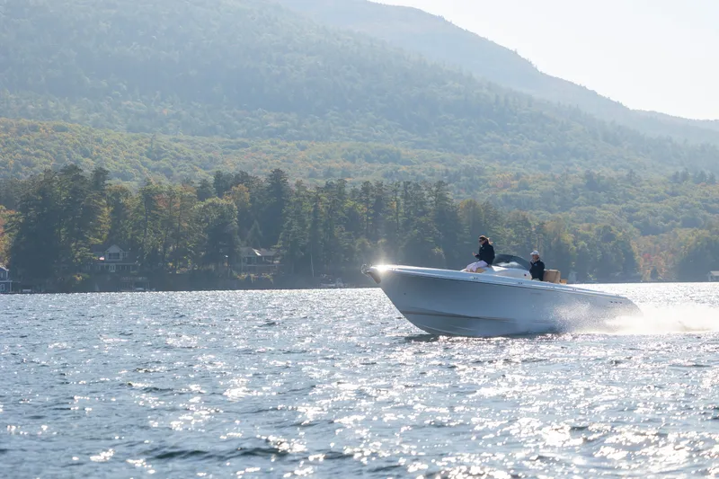 Slide: The Image of 2022 Comitti ISOLA 33 Sport SD cruising on a scenic lake. - 31