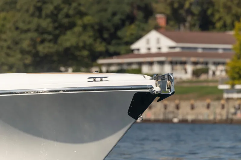 Slide: The Image of Comitti ISOLA 33 Sport SD 2022 boat bow on water, scenic background. - 43