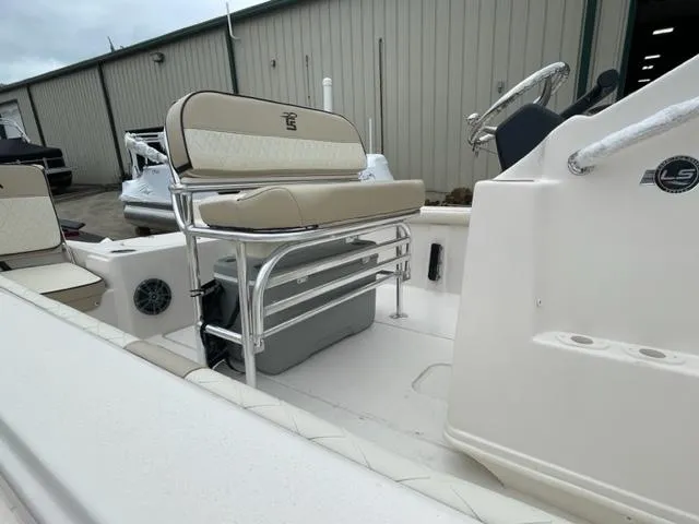 Slide: The Image of 2024 Carolina Skiff 19LS boat interior with seating and storage. - 3