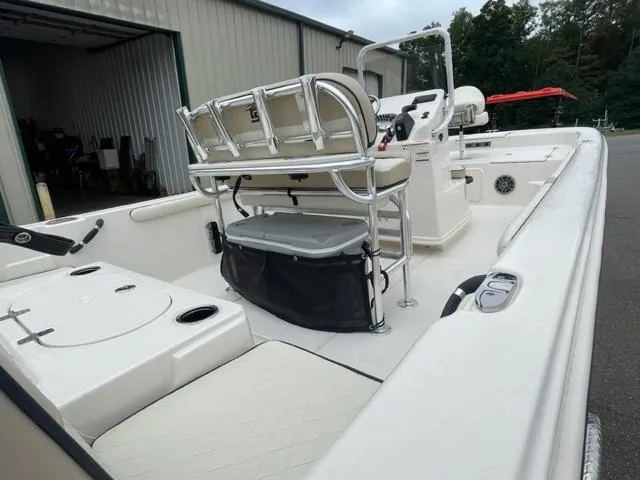 Slide: The Image of 2024 Carolina Skiff 19LS boat interior with seating and storage compartments. - 4