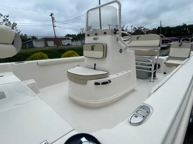 Slide: The Image of 2024 Carolina Skiff 19LS boat interior with seating and console. - 8