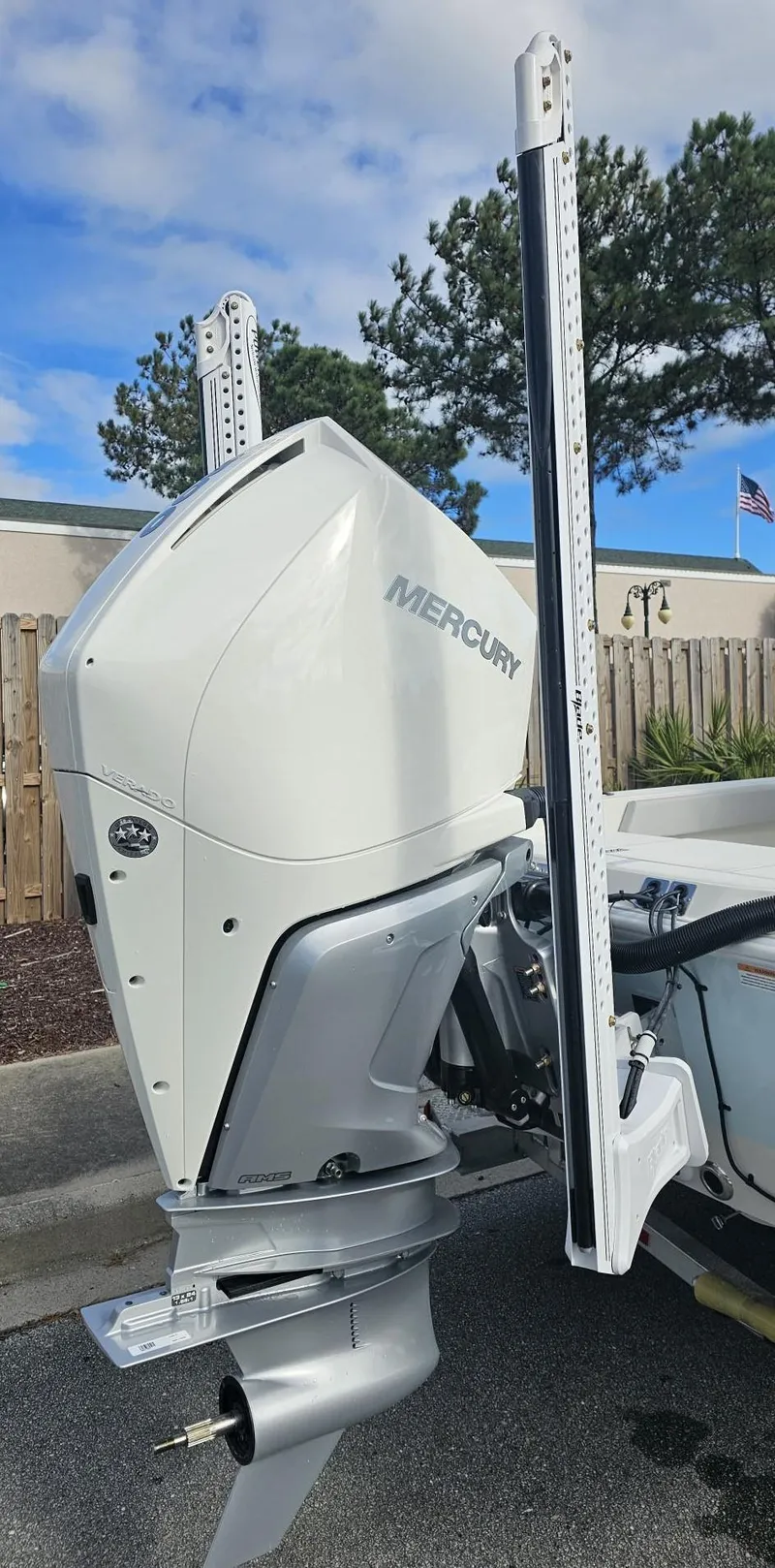 Slide: The Image of 2024 Ranger 2510 Bay boat with Mercury outboard motor. - 11