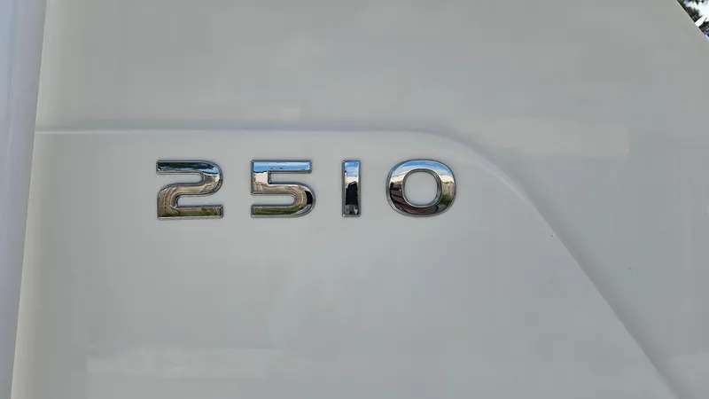 Slide: The Image of 2024 Ranger 2510 Bay model emblem on white surface - 15