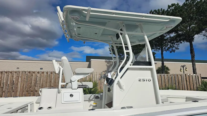 Slide: The Image of 2024 Ranger 2510 Bay boat with T-top and dual seating. - 5