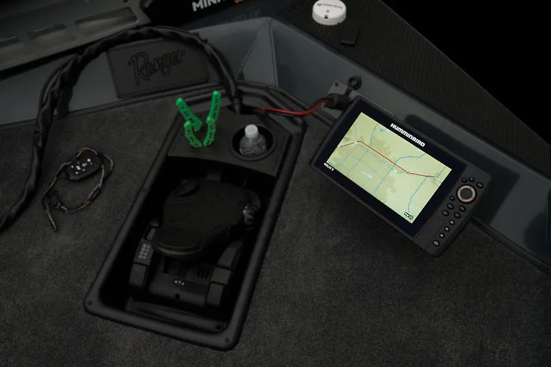 Slide: The Image of 2024 Ranger RT188 boat dashboard with Humminbird fishfinder and control panel. - 30