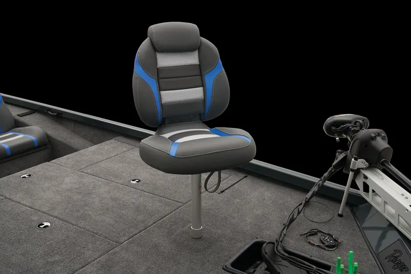 Slide: The Image of 2024 Ranger RT188 boat with cushioned seat and fishing equipment. - 34