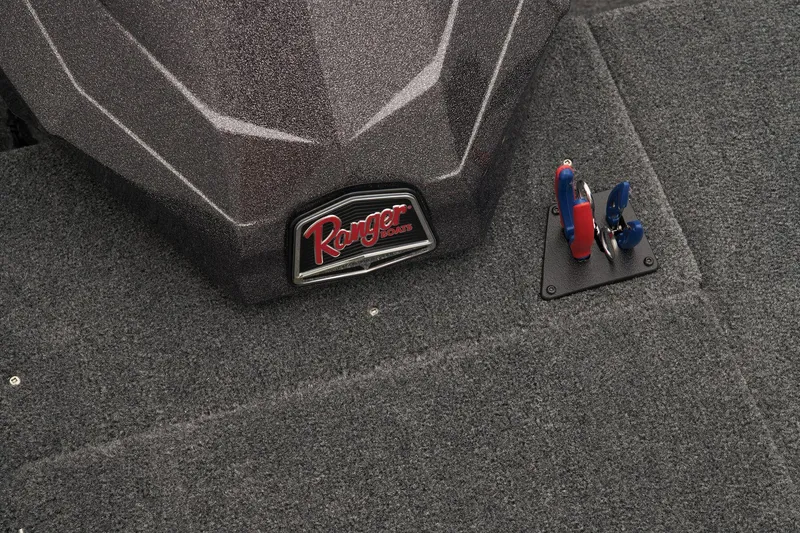 Slide: The Image of 2024 Ranger RT188 boat deck with logo and control levers. - 38
