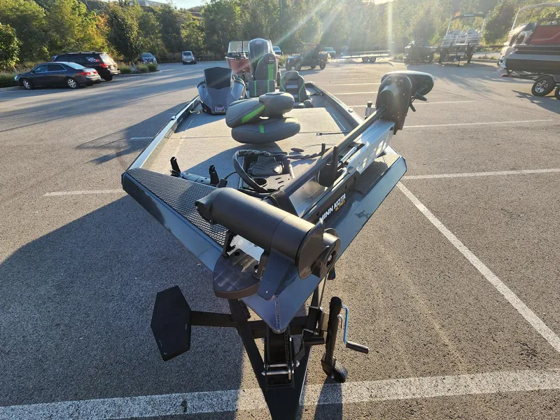 Slide: The Image of 2024 Ranger RT188 boat in parking lot, front view, sunny day. - 4