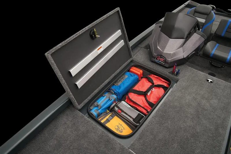 Slide: The Image of 2024 Ranger RT188 boat storage compartment with organized gear and equipment. - 40