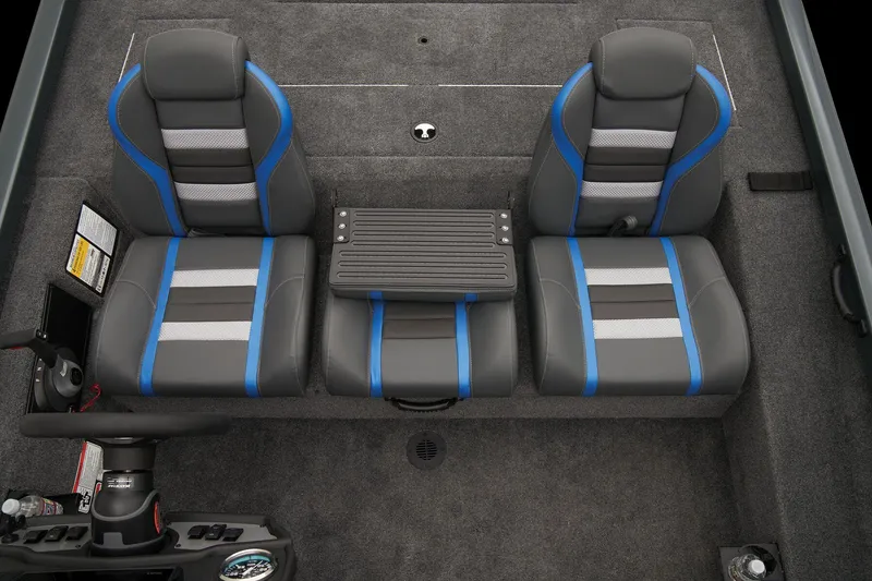 Slide: The Image of 2024 Ranger RT188 boat interior with three seats and a center console. - 52