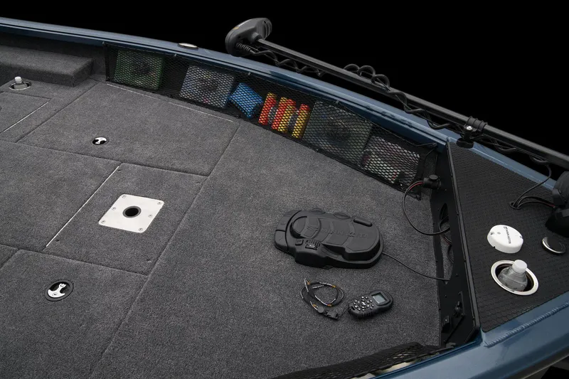 Slide: The Image of 2024 Ranger VS1782SC Reata boat deck with storage compartments and fishing gear. - 29