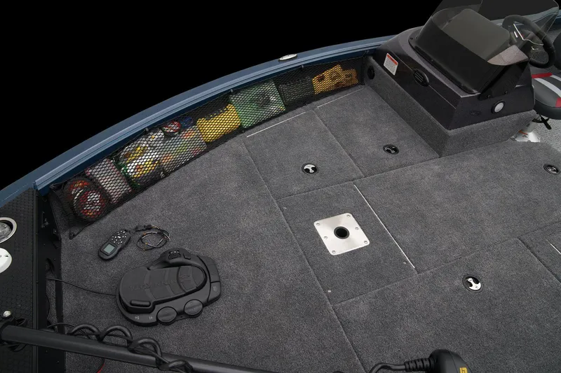 Slide: The Image of 2024 Ranger VS1782SC Reata boat interior with storage compartments and control panel. - 32