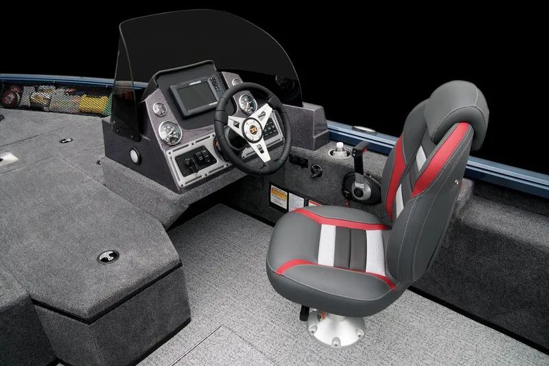 Slide: The Image of 2024 Ranger VS1782SC Reata boat cockpit with steering wheel and captain's chair. - 44