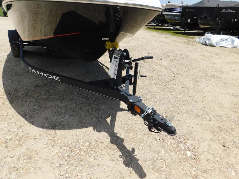 Slide: The Image of 2024 Tahoe T18 boat trailer hitch on gravel lot. - 40