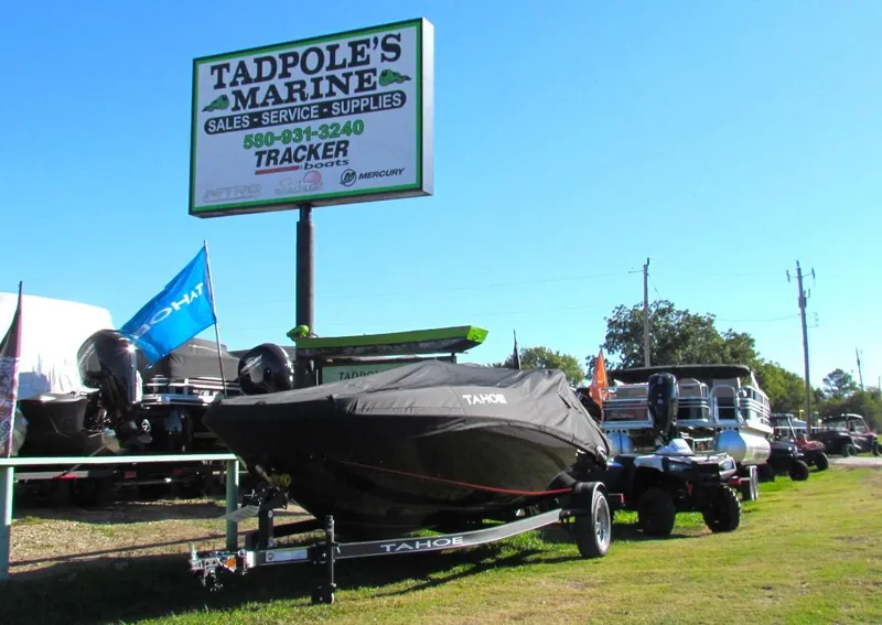 Slide: The Image of 2024 Tahoe T18 boat at Tadpole's Marine dealership. - 41