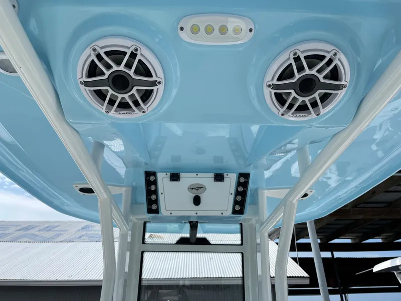 Slide: The Image of Tidewater 232 LXF 2025 boat with overhead speakers and LED lights. - 5