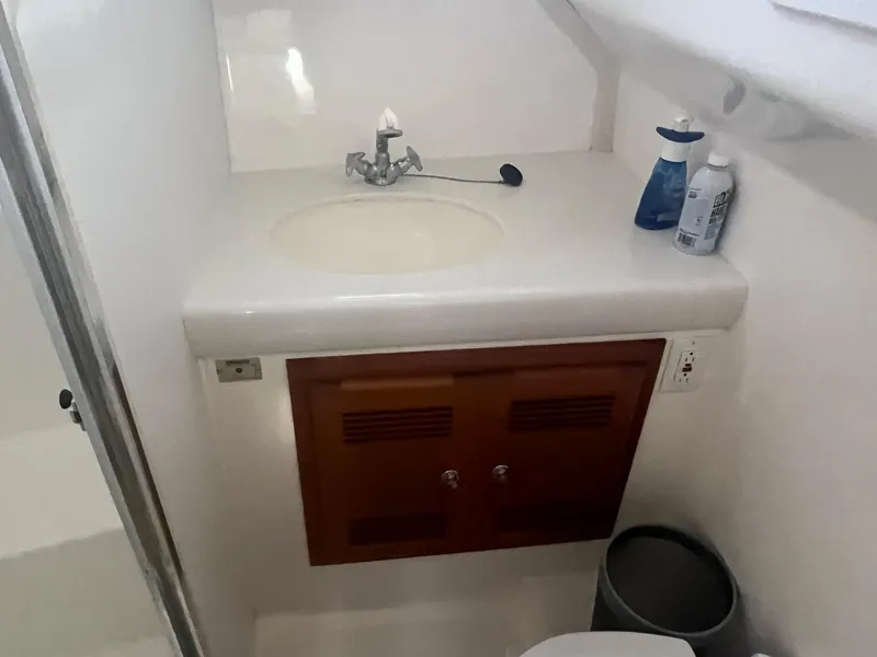 Slide: The Image of Bathroom in 2002 Cabo 35 Flybridge boat. - 15