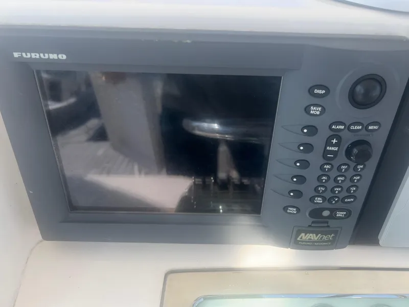 Slide: The Image of Furuno navigation system on a 2002 Cabo 35 Flybridge boat. - 17