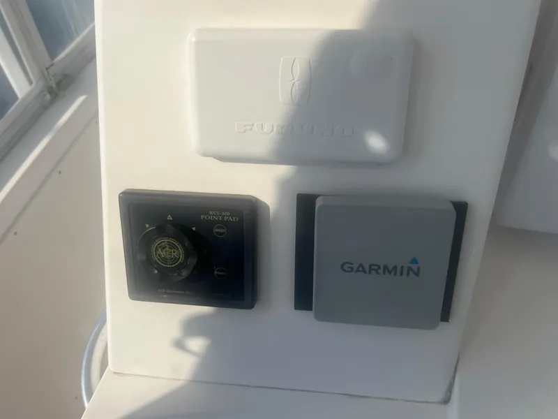 Slide: The Image of Garmin and Furuno equipment on 2002 Cabo 35 Flybridge. - 19